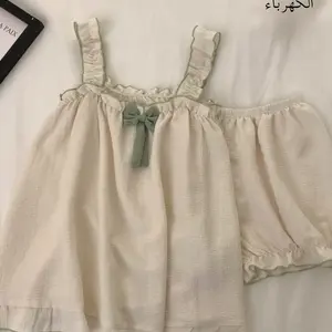 طقم ملابس نوم نسائي صيفي رقيق نقي على طراز الرغبة ملابس منزلية فضفاضة لطيفة مكونة من قطعتين بدون حمالات من ألياف البوليستر بد...