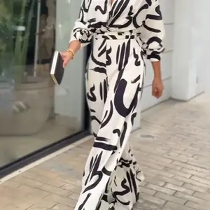 بذلة نسائية بأكمام طويلة ورقبة على شكل حرف V بخصر مرتفع وساق واسع ، ملابس تنقل للسيدات ، طباعة بالأبيض والأسود ، موضة الربيع والخريف